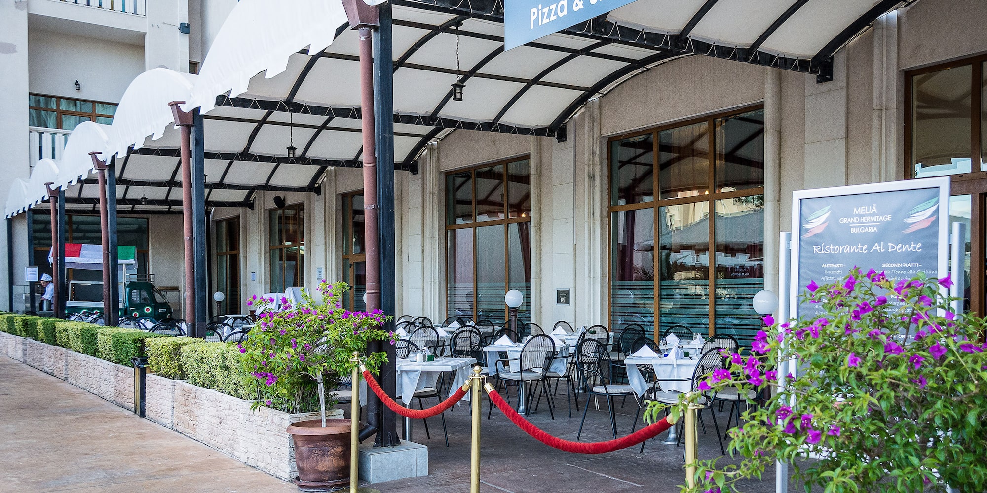a building with tables and chairs