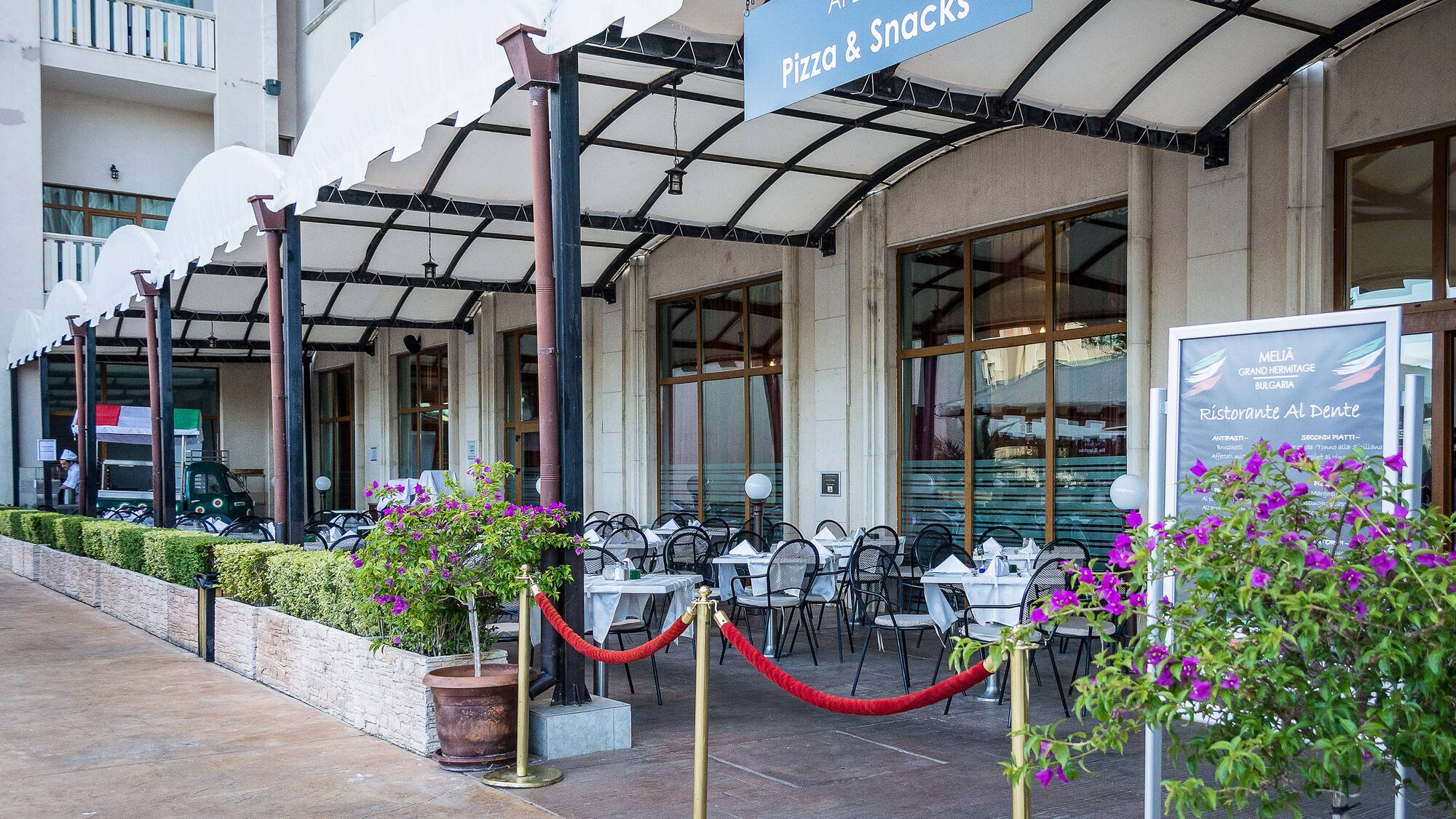 a building with tables and chairs