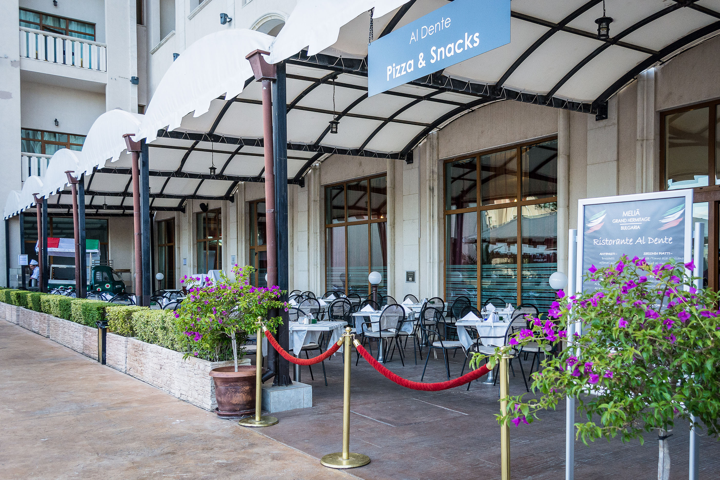 a building with tables and chairs