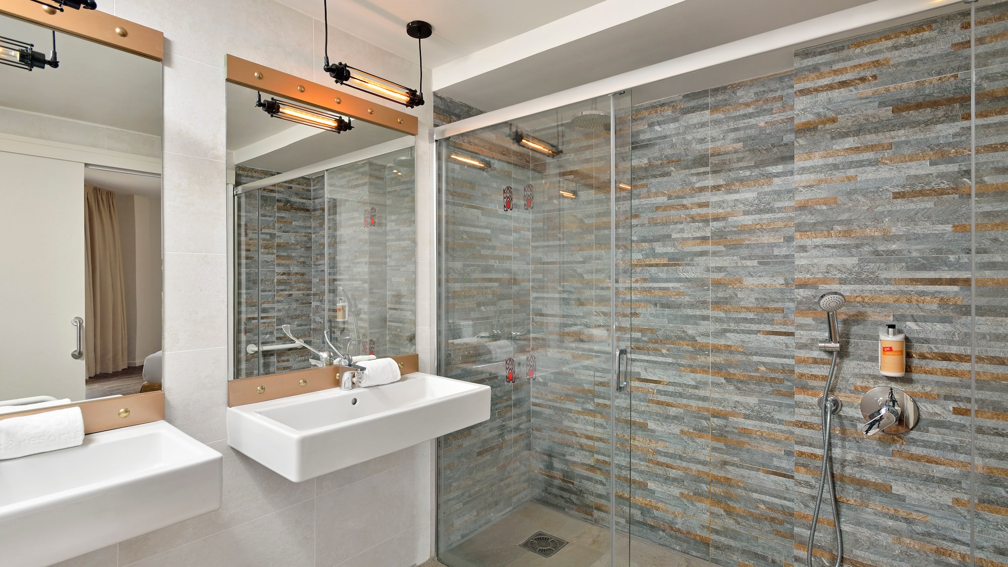 a bathroom with a shower and sink