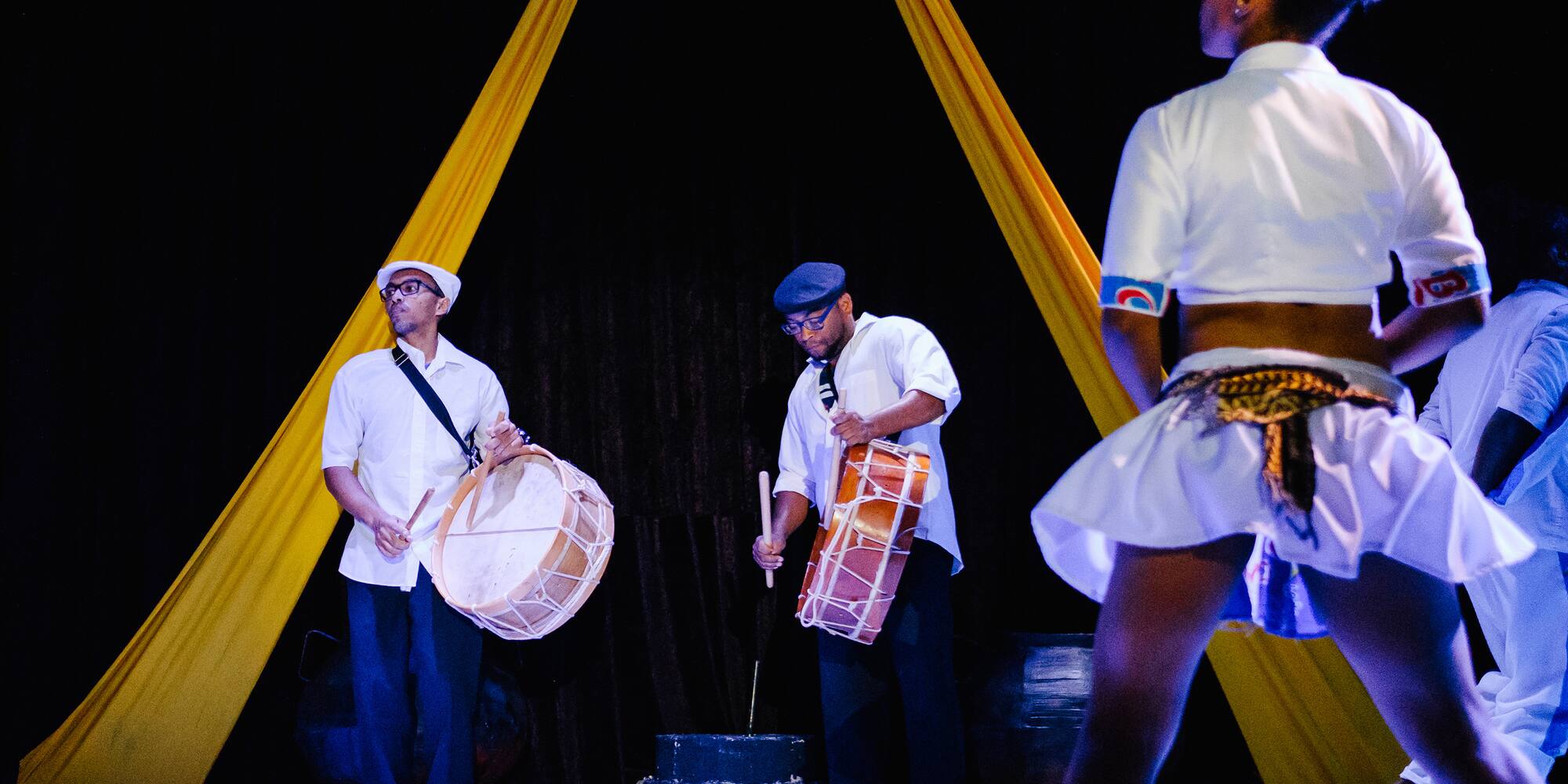a group of people playing drums