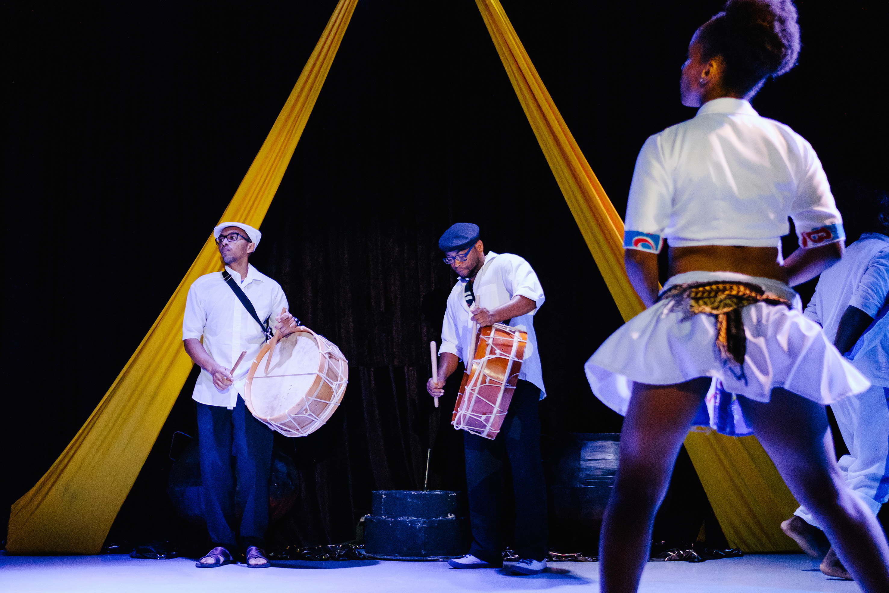 a group of people playing drums