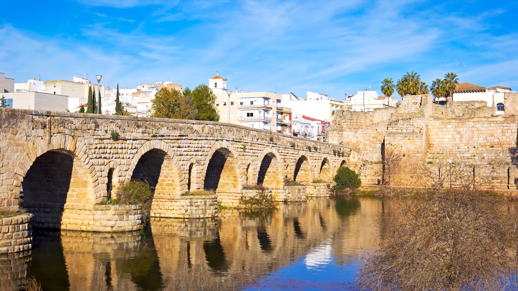 a stone bridge over water