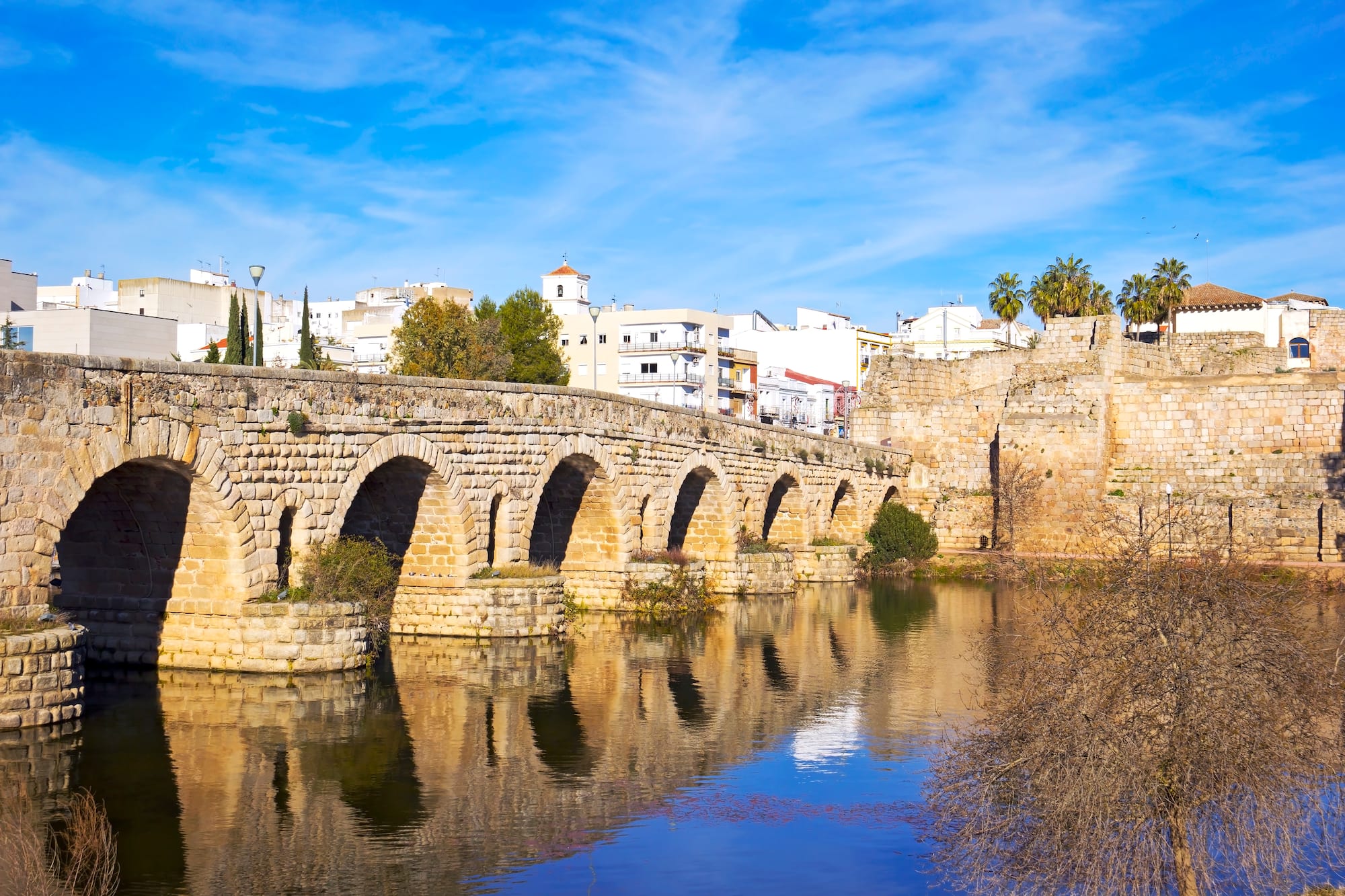 a stone bridge over water