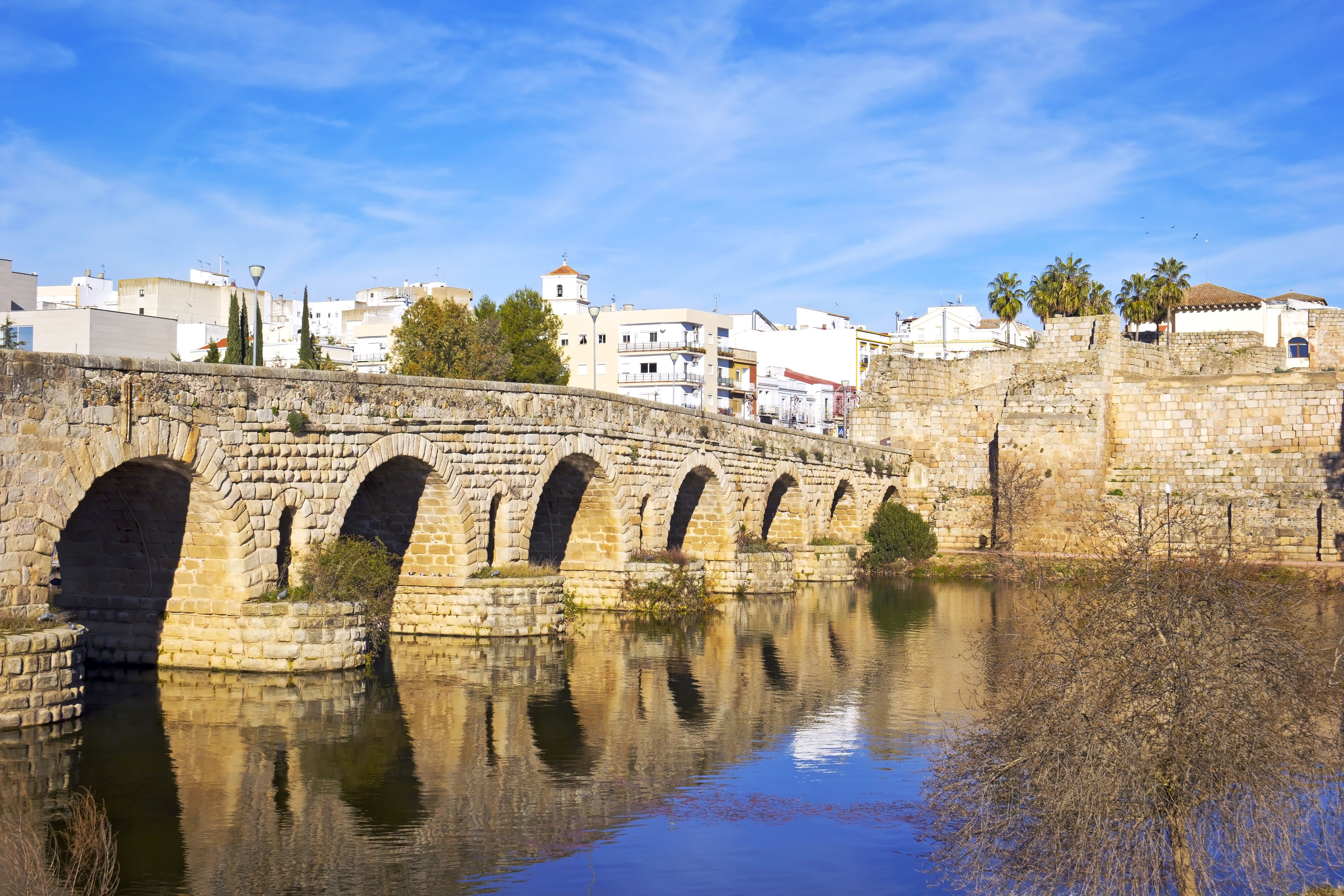 a stone bridge over water