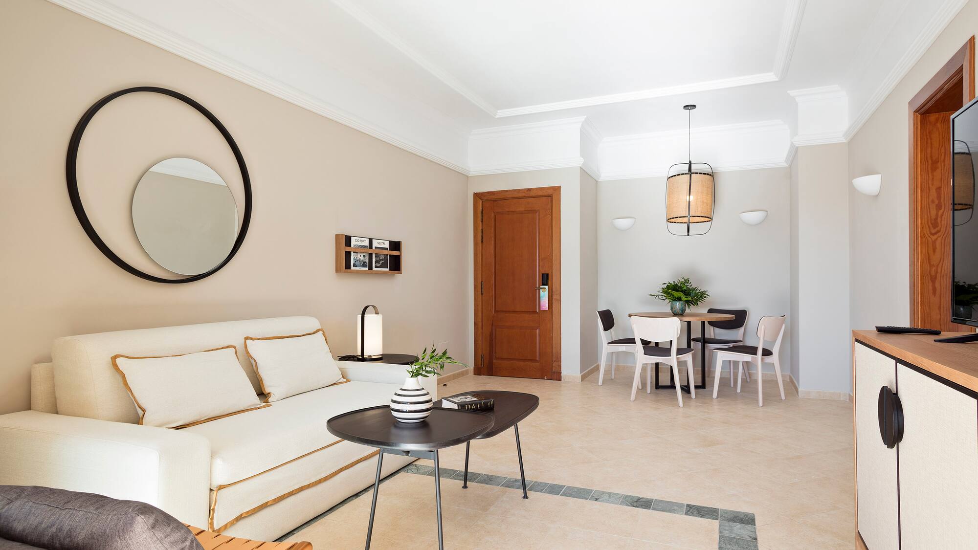 a living room with a couch and a table