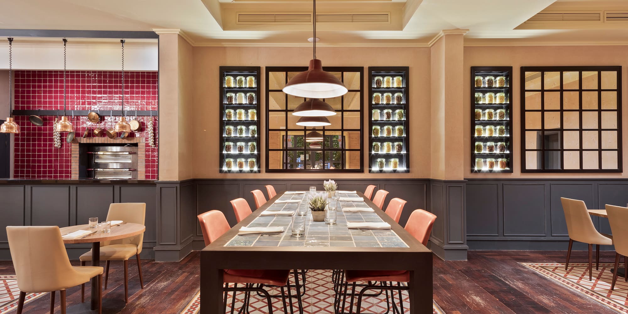 a dining room with a table and chairs