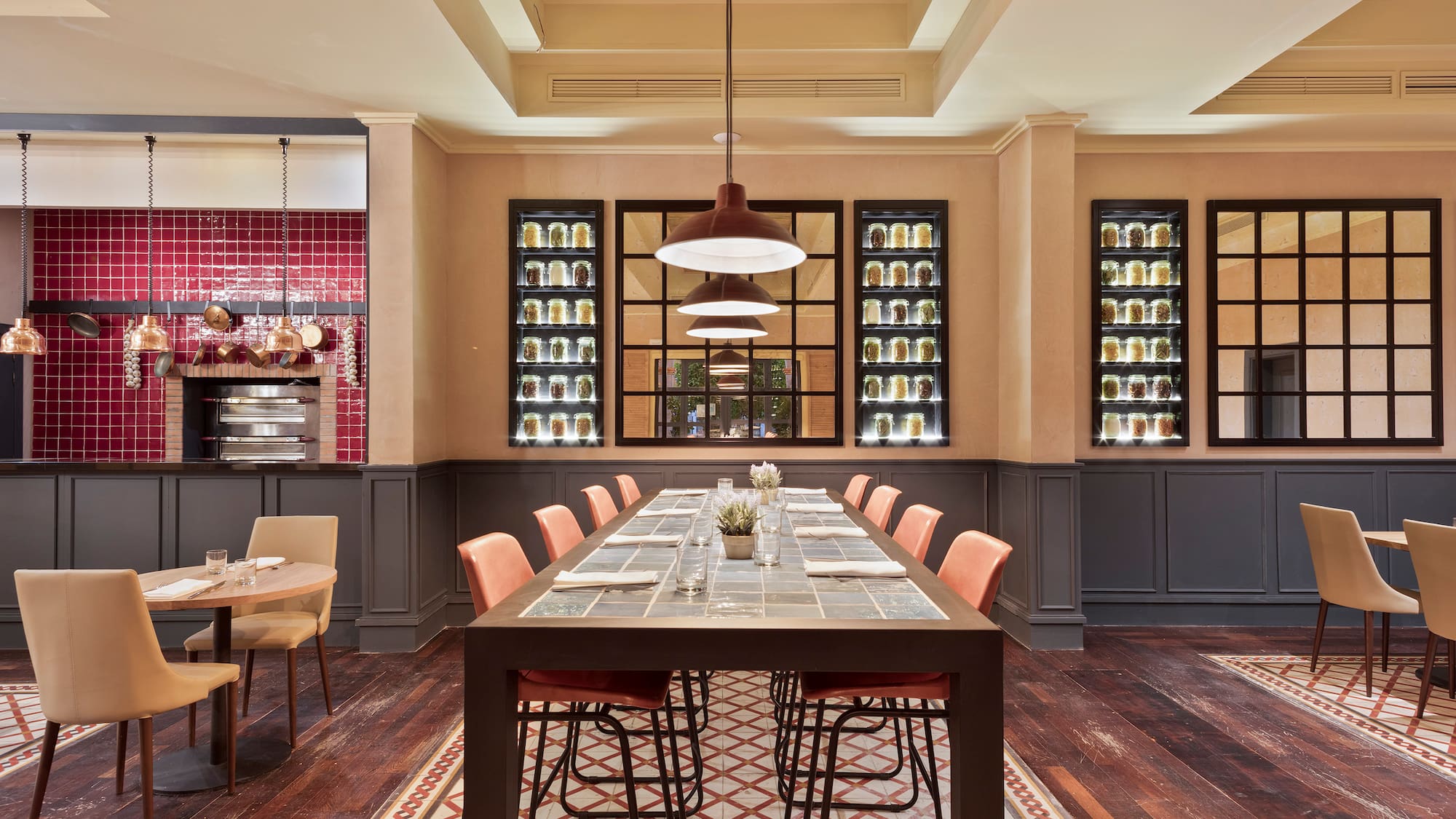 a dining room with a table and chairs