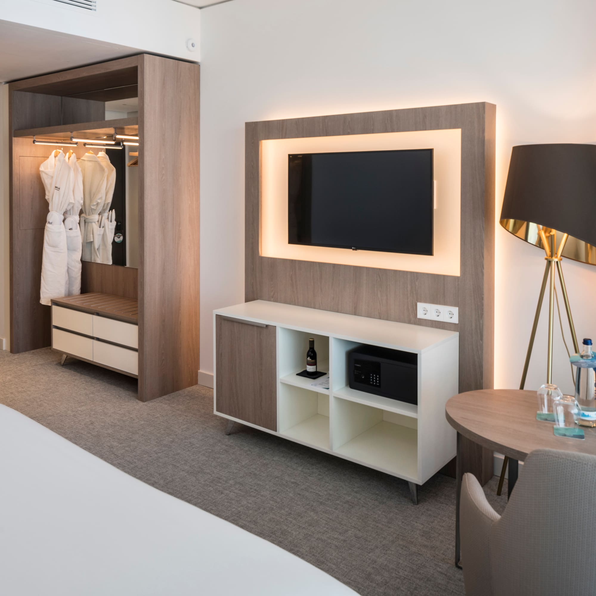 a room with a tv and a table