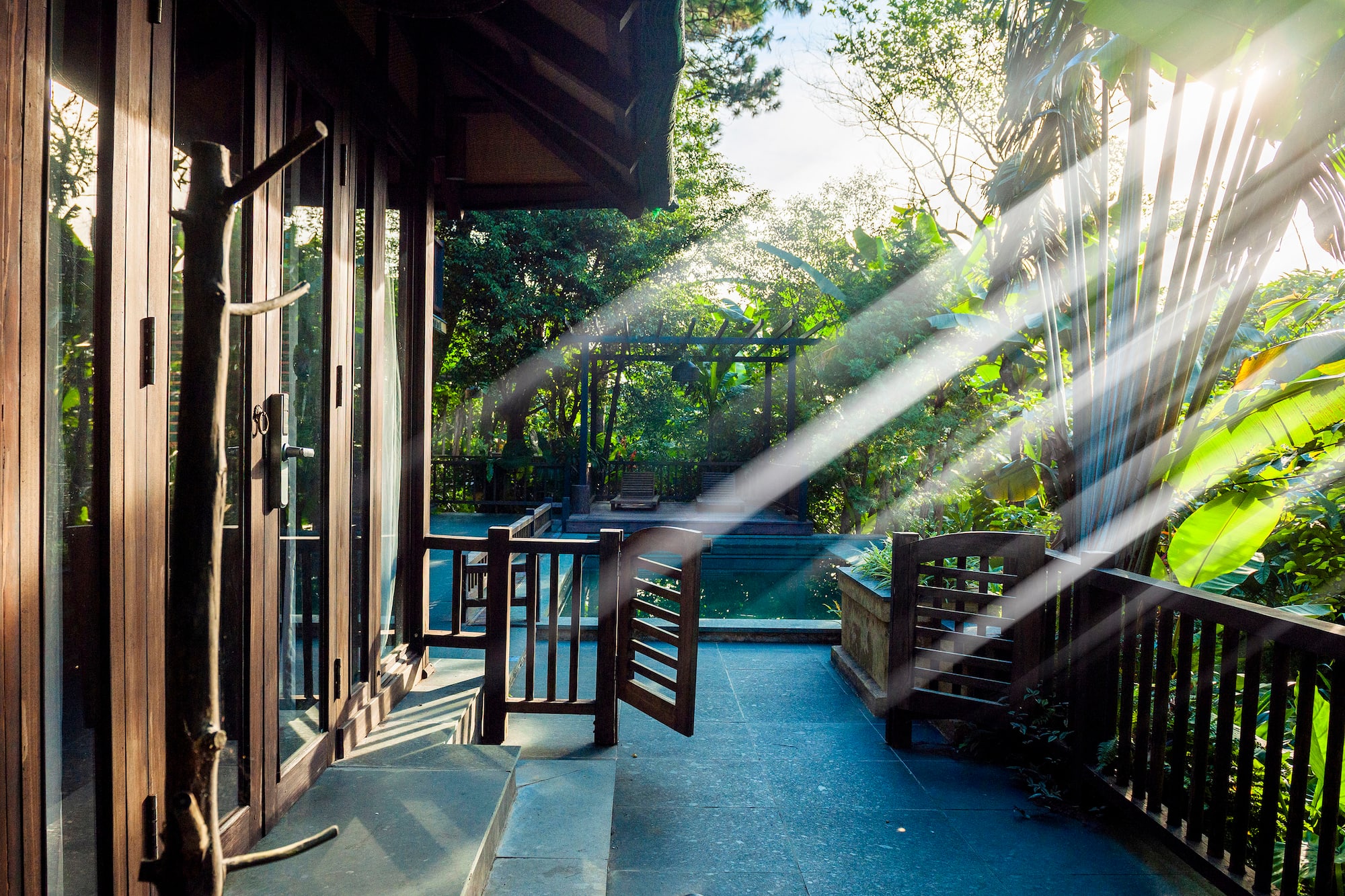 sun shining through the sunlight on a porch