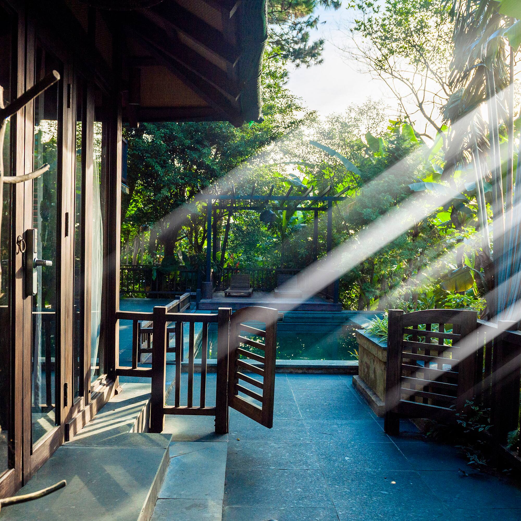 sun shining through the sunlight on a porch