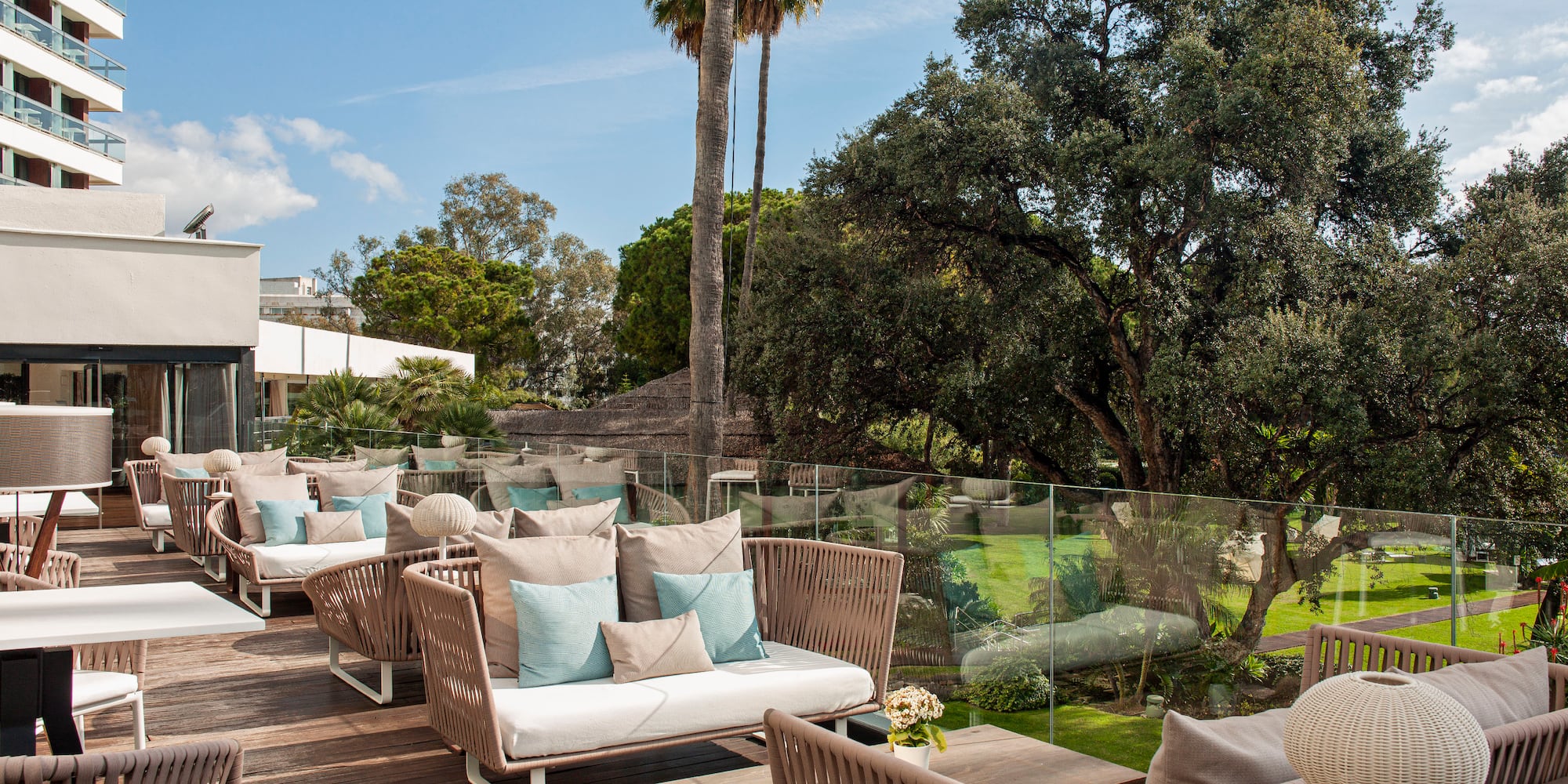 a patio with chairs and tables