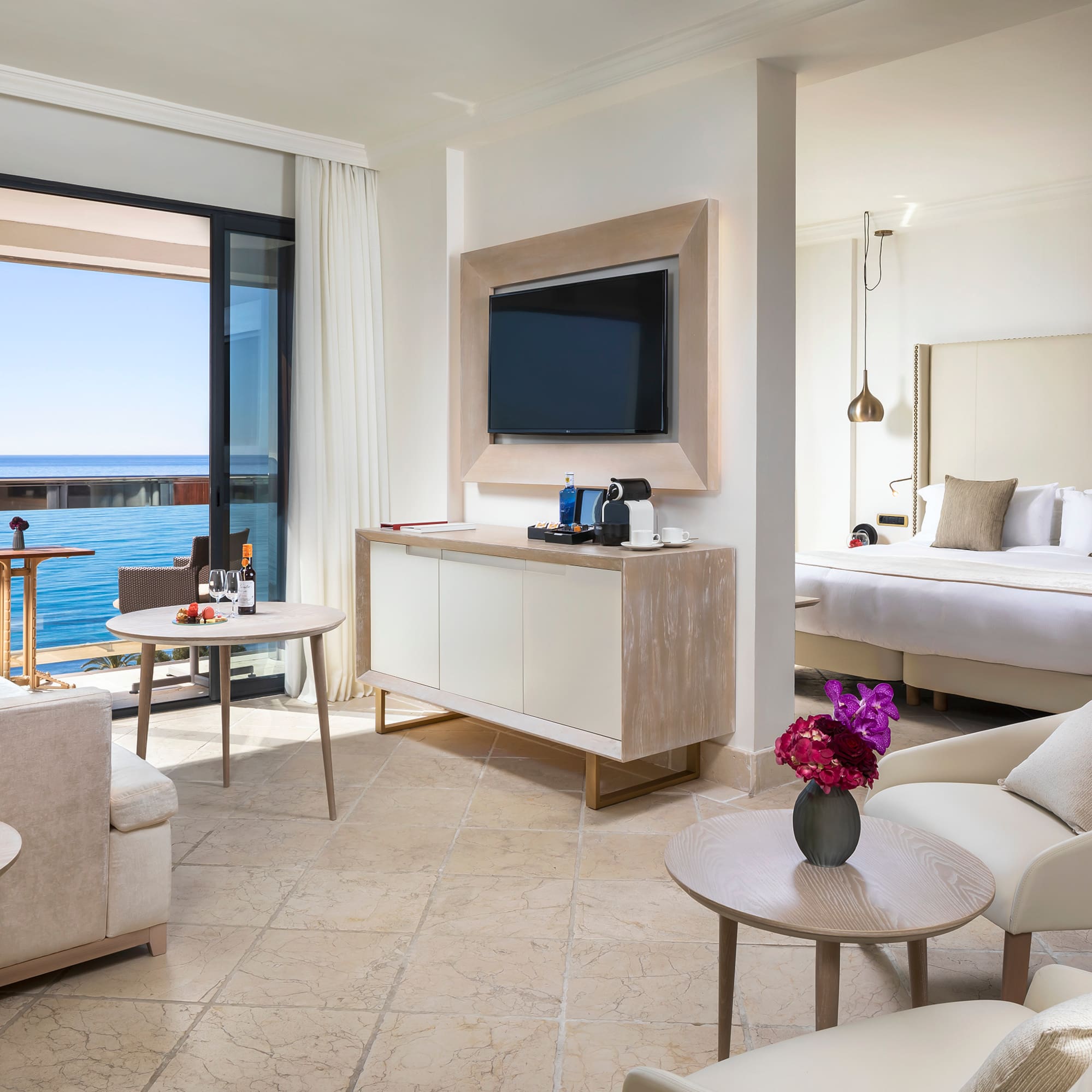 a room with a television and a bed