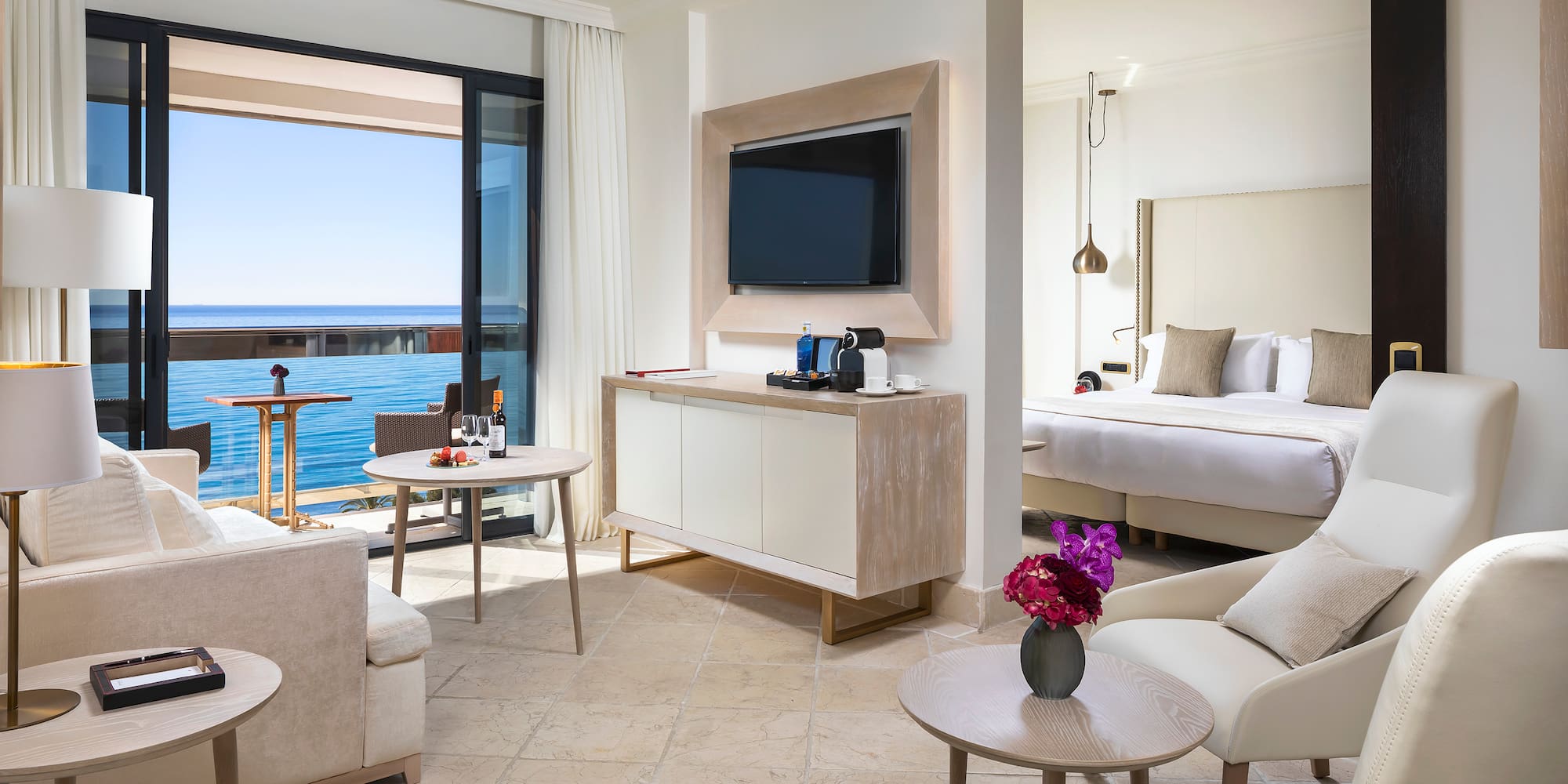 a room with a television and a bed