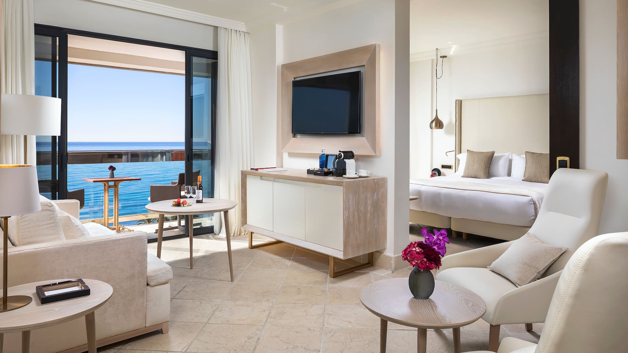 a room with a television and a bed