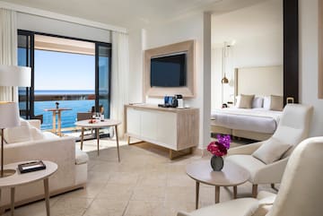 a room with a television and a bed