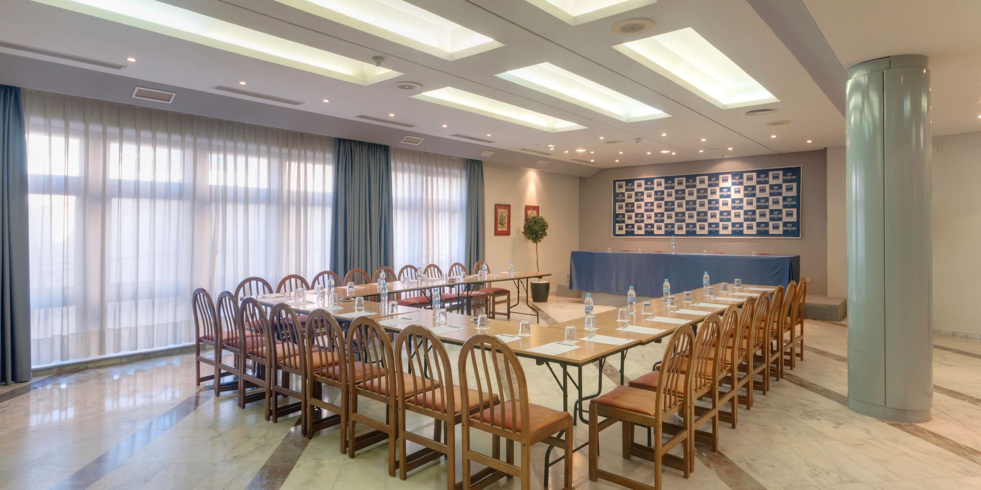 a room with a table and chairs