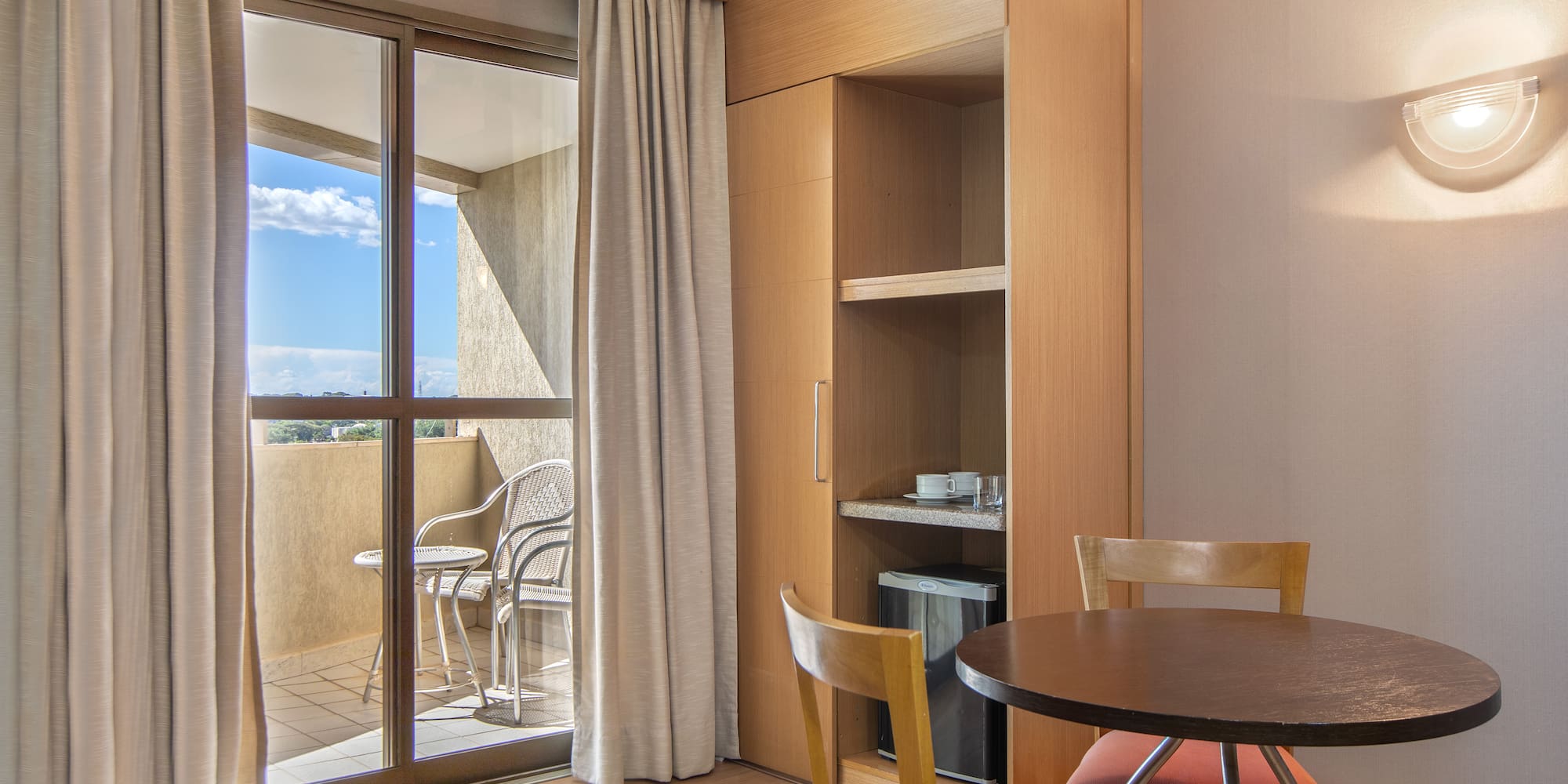 a room with a table and chairs