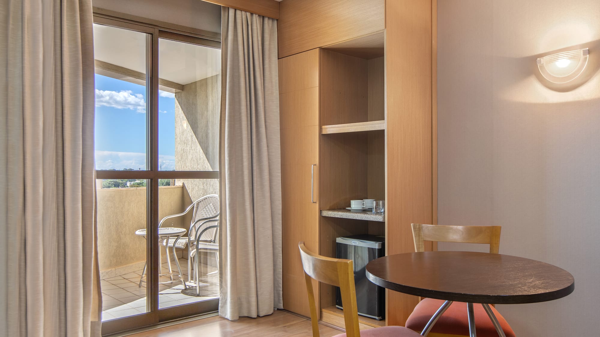 a room with a table and chairs