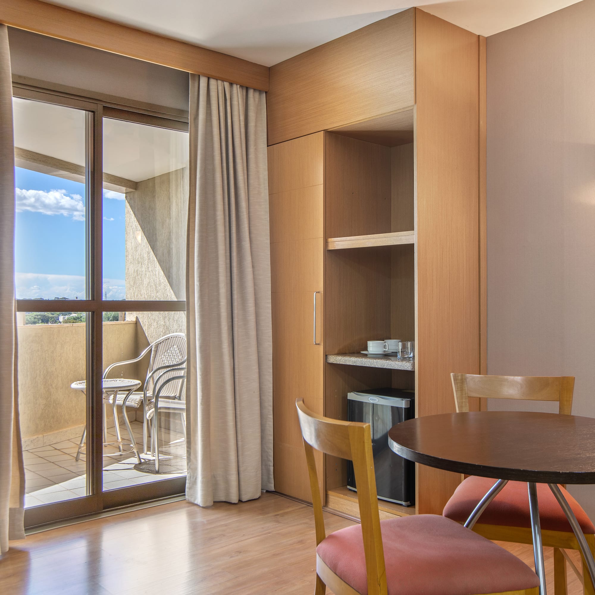 a room with a table and chairs