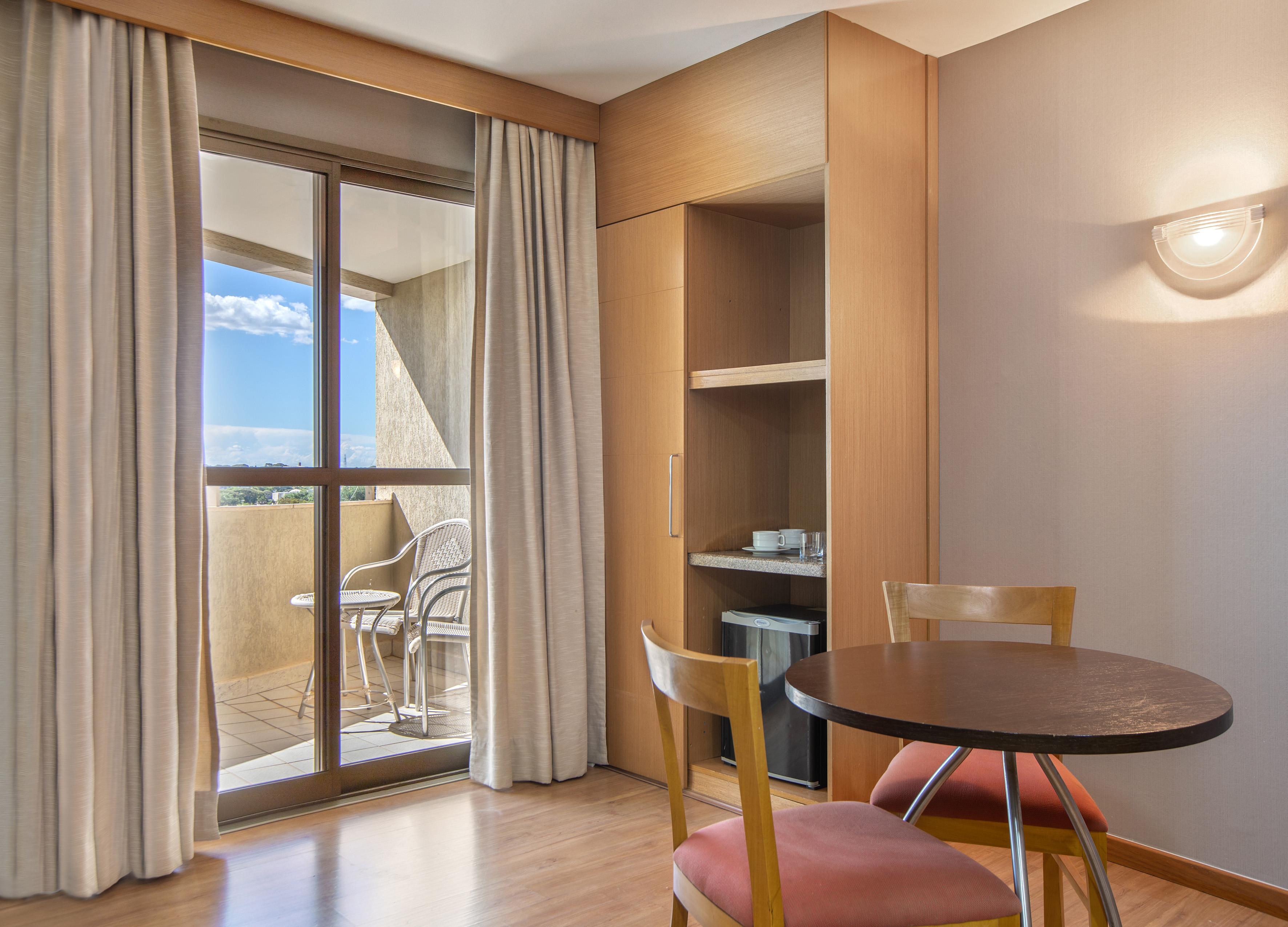 a room with a table and chairs