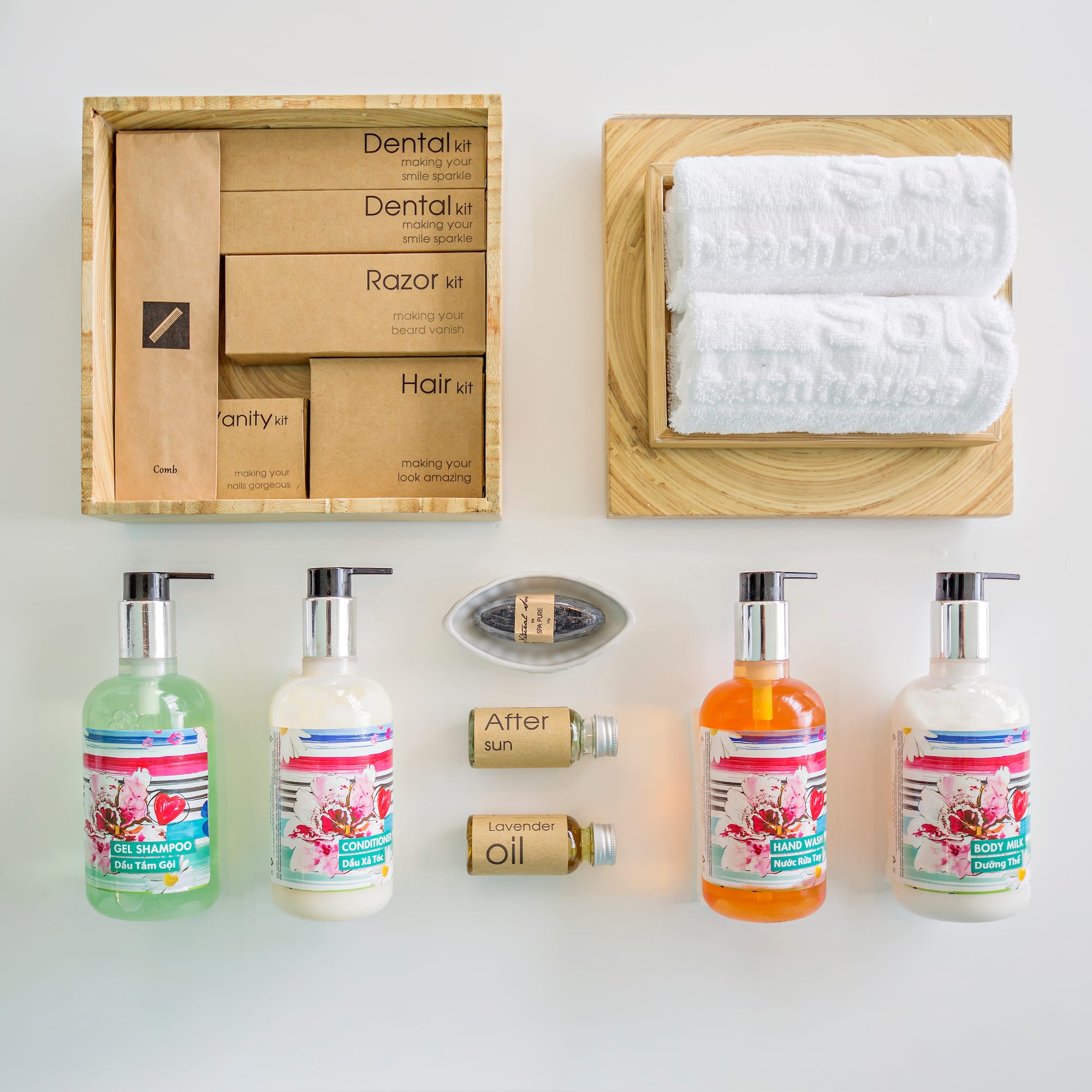 a group of bottles of liquid and a towel