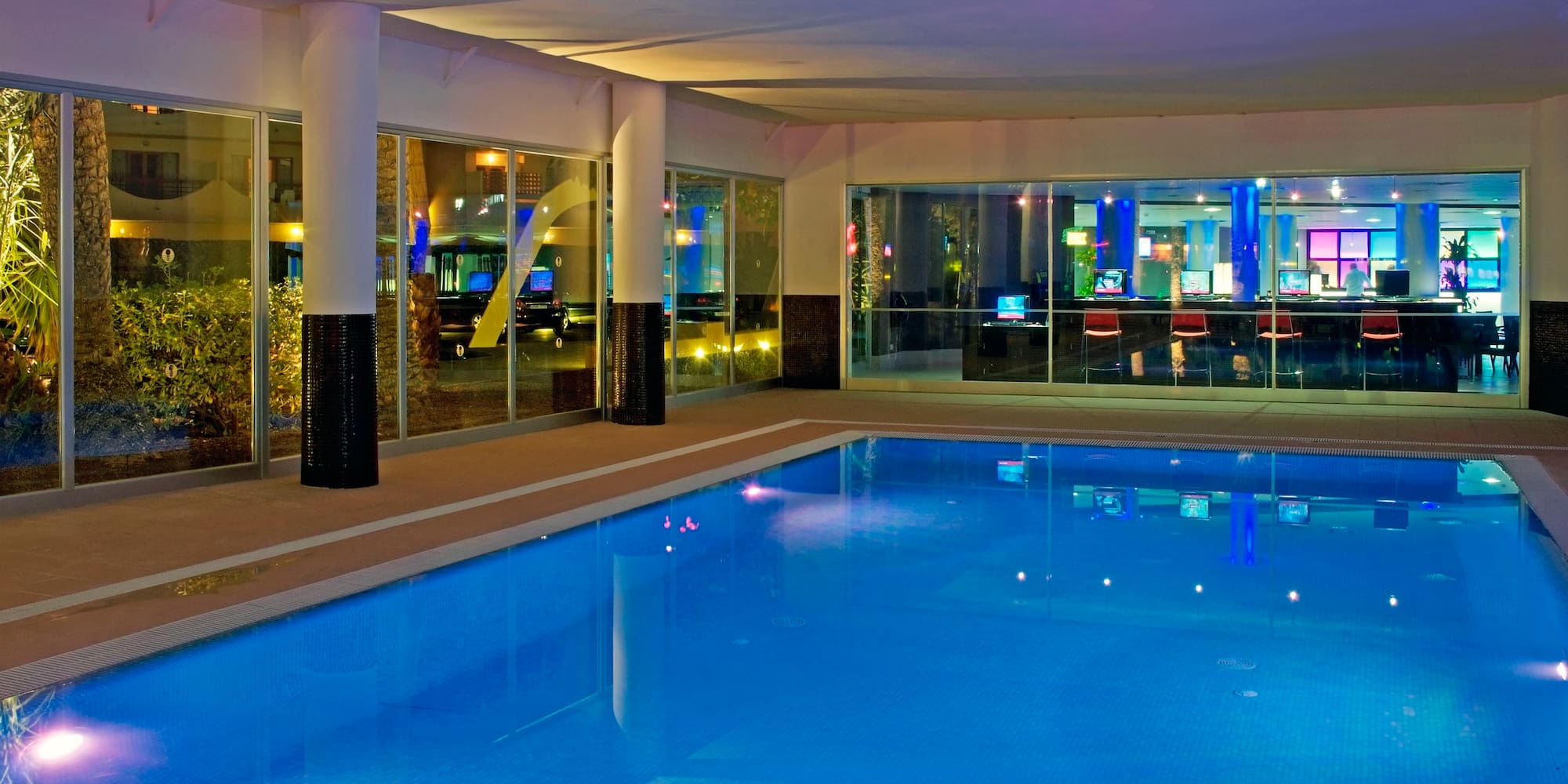 a swimming pool inside a building