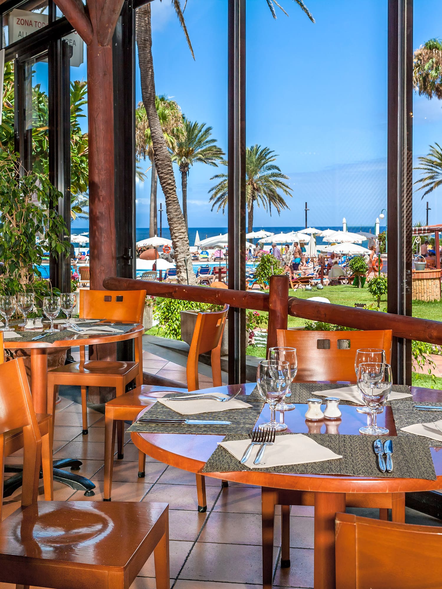 a restaurant with tables and chairs