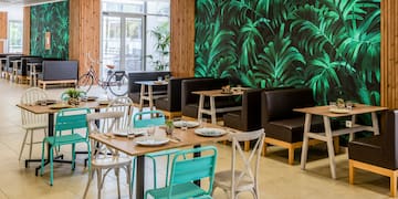 a room with tables and chairs