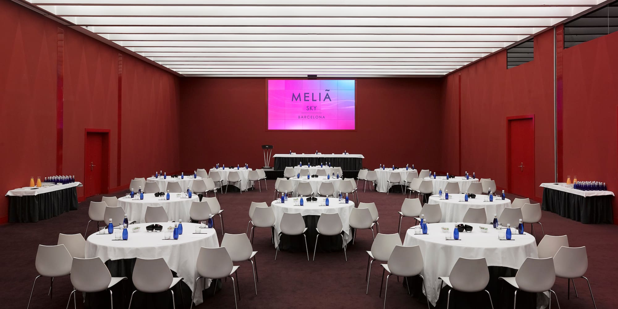 a room with tables and chairs