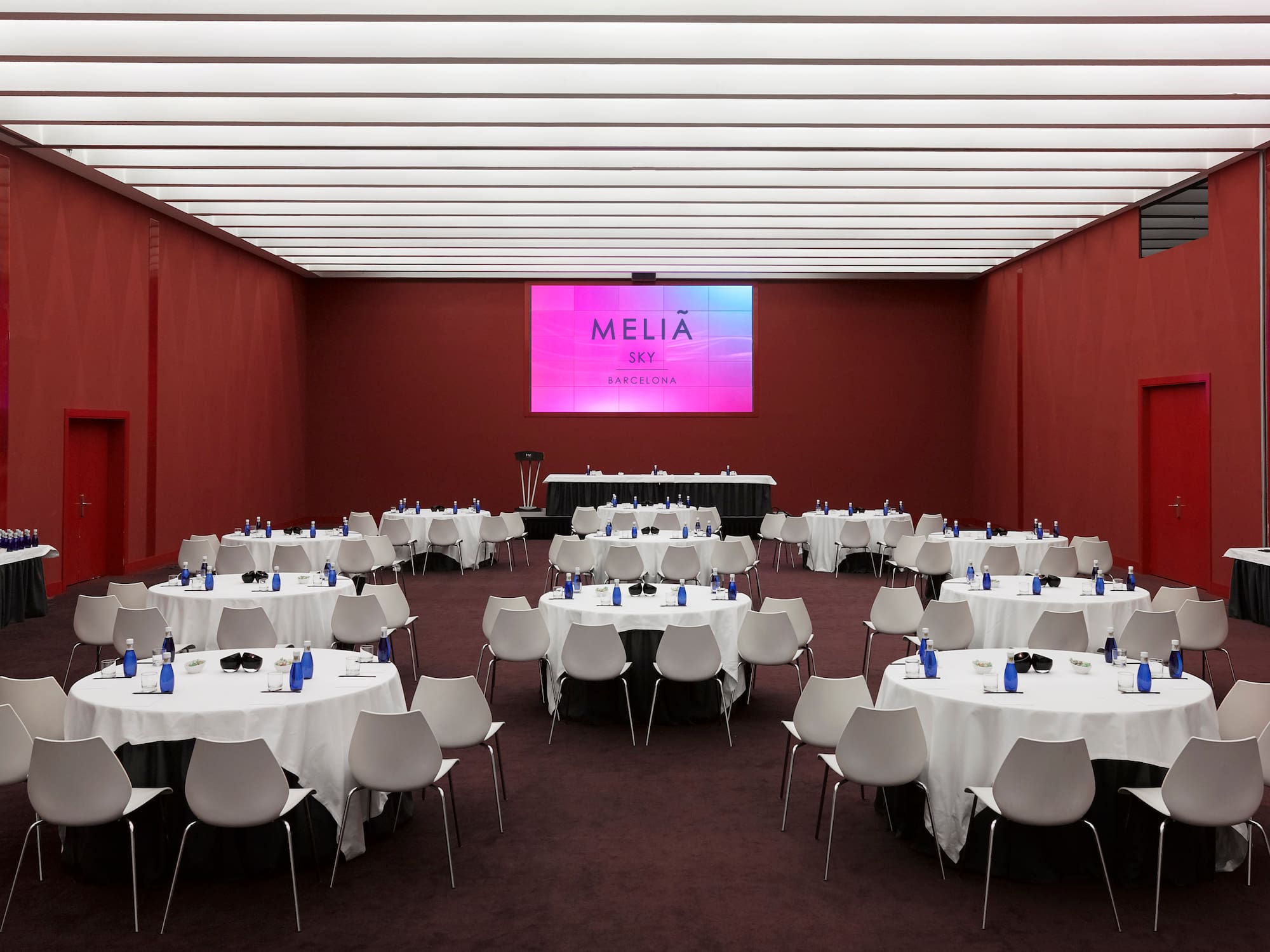 a room with tables and chairs