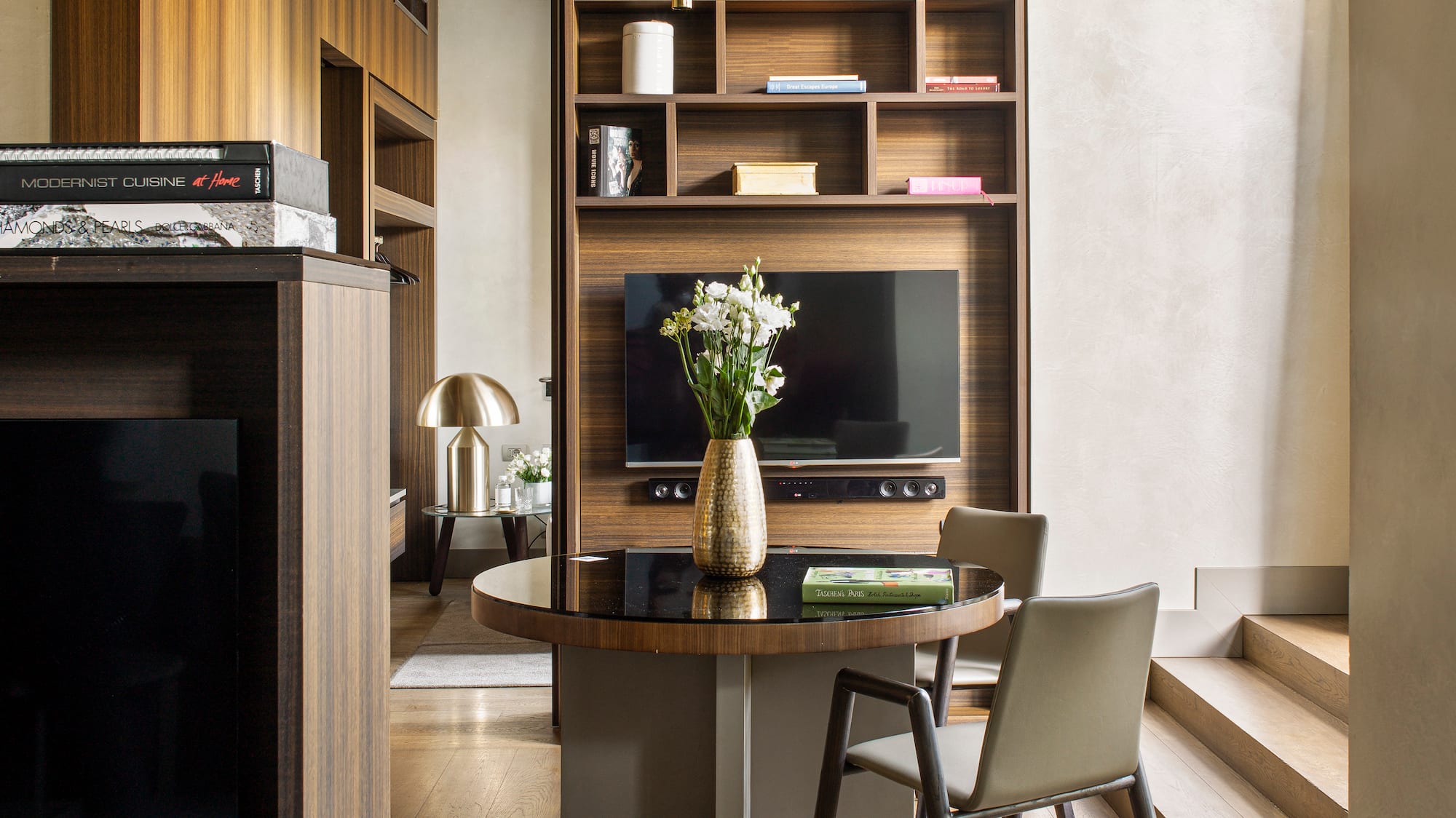 a room with a table and chairs