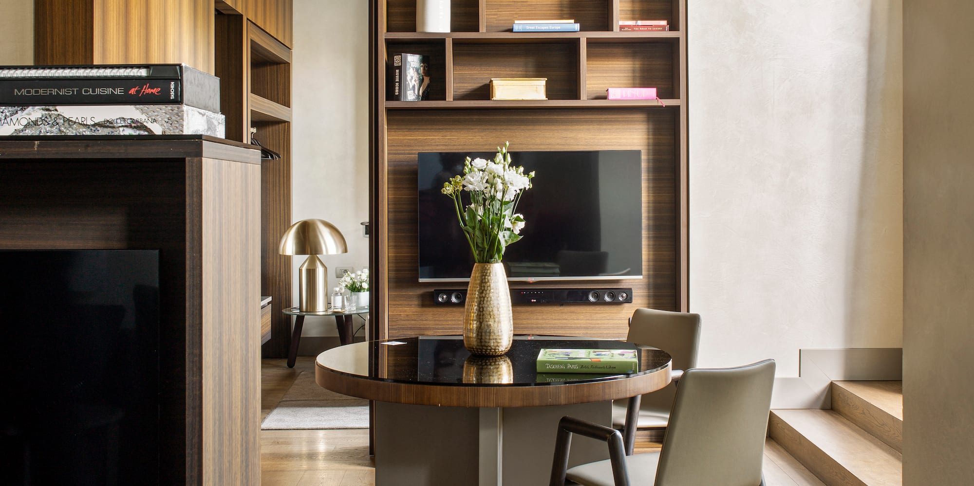 a room with a table and chairs