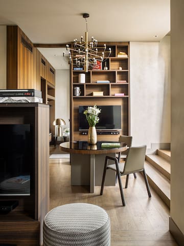 a room with a table and chairs