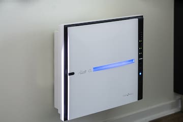 a white box with a blue light on it