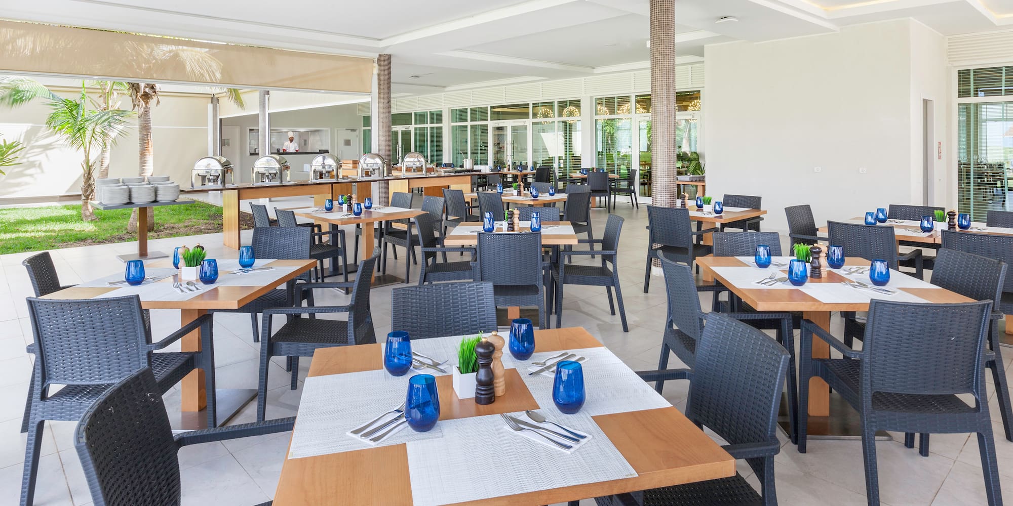 a room with tables and chairs