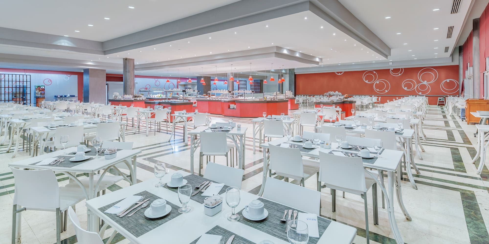 a large room with tables and chairs