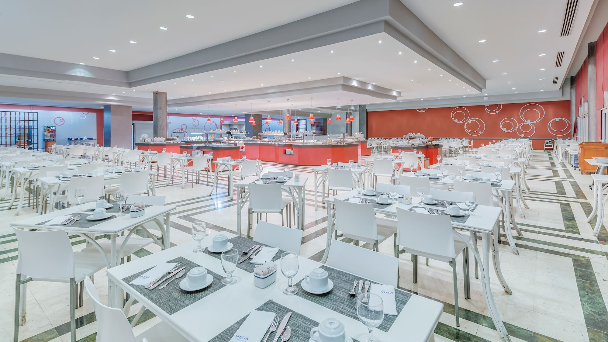 a large room with tables and chairs