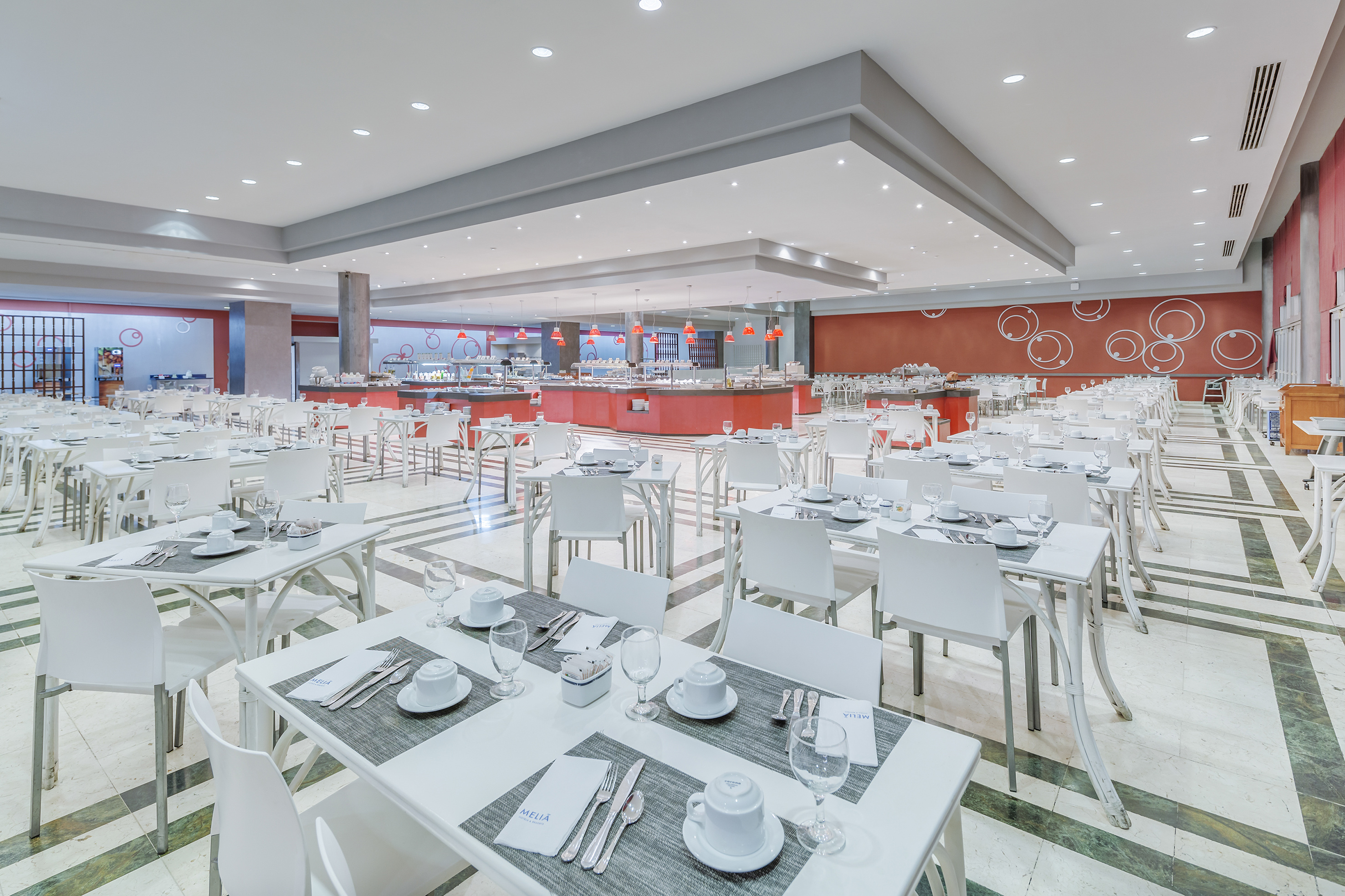 a large room with tables and chairs