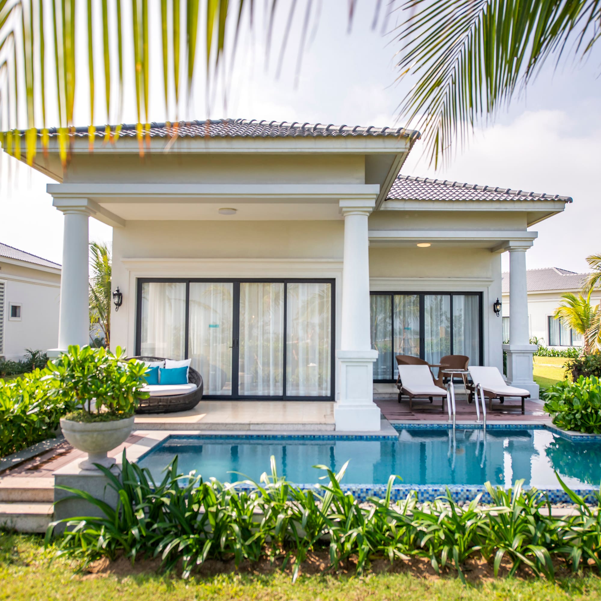 a pool in front of a house