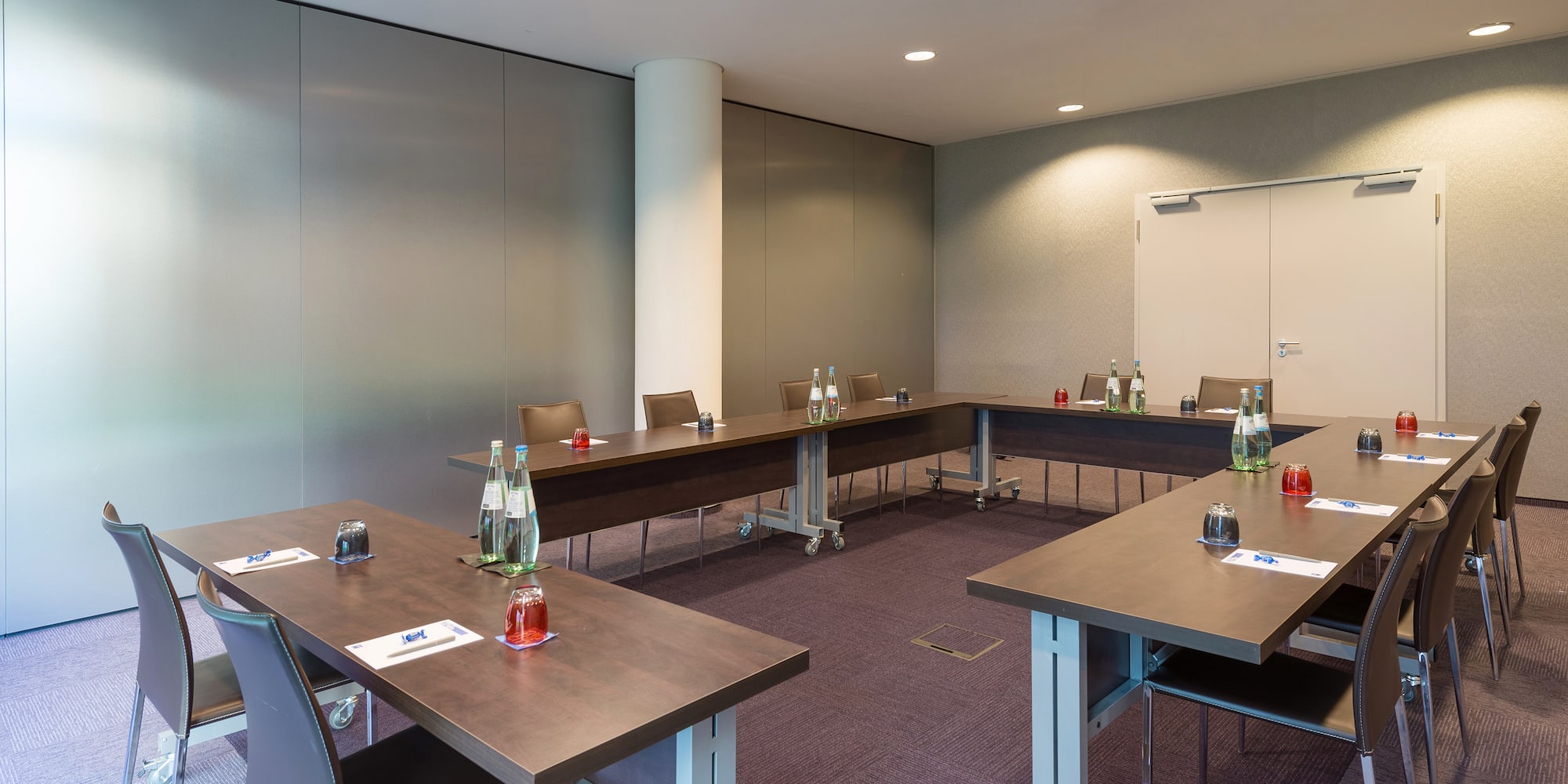 a room with tables and chairs