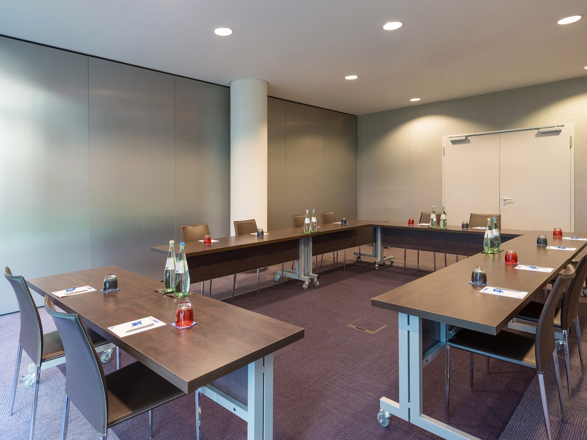 a room with tables and chairs