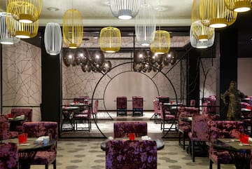 a room with tables and chairs