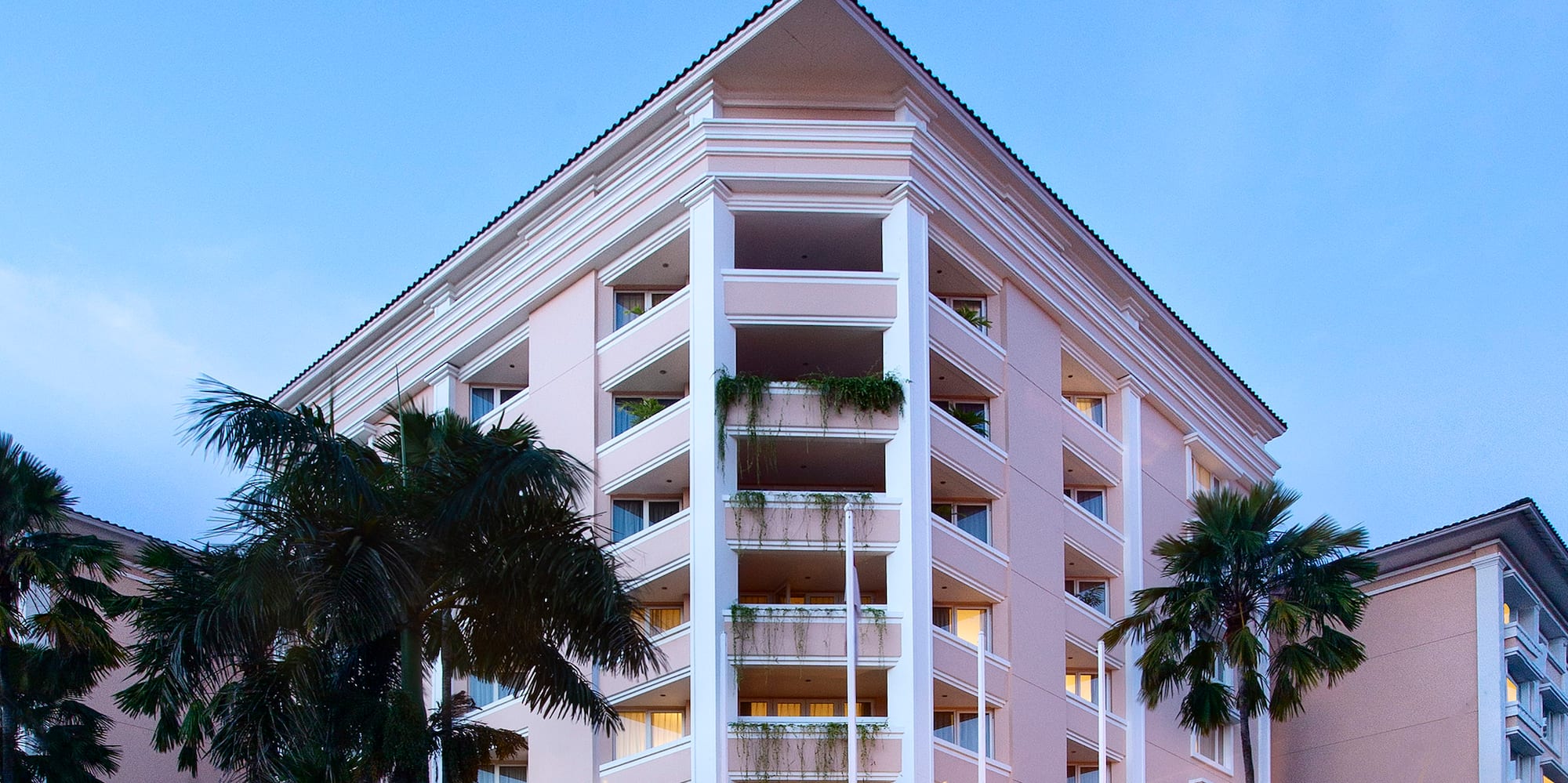 a building with palm trees