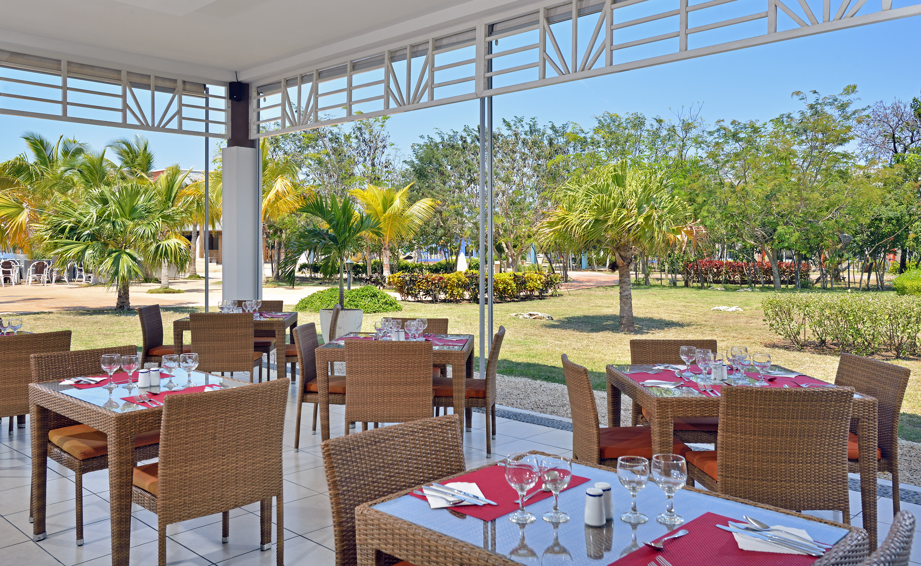 a restaurant with tables and chairs