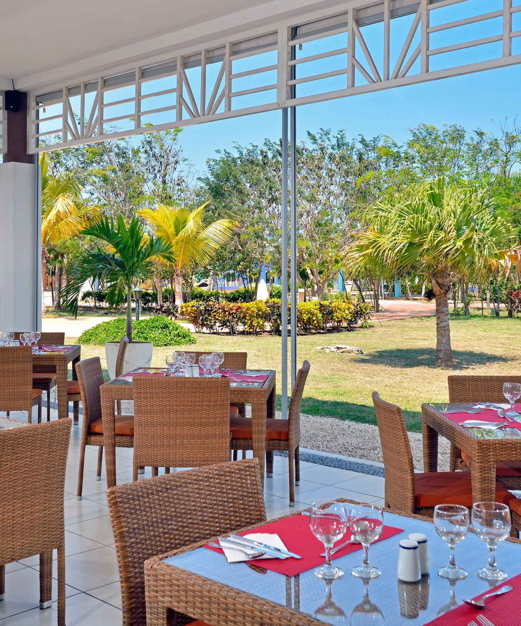 a restaurant with tables and chairs