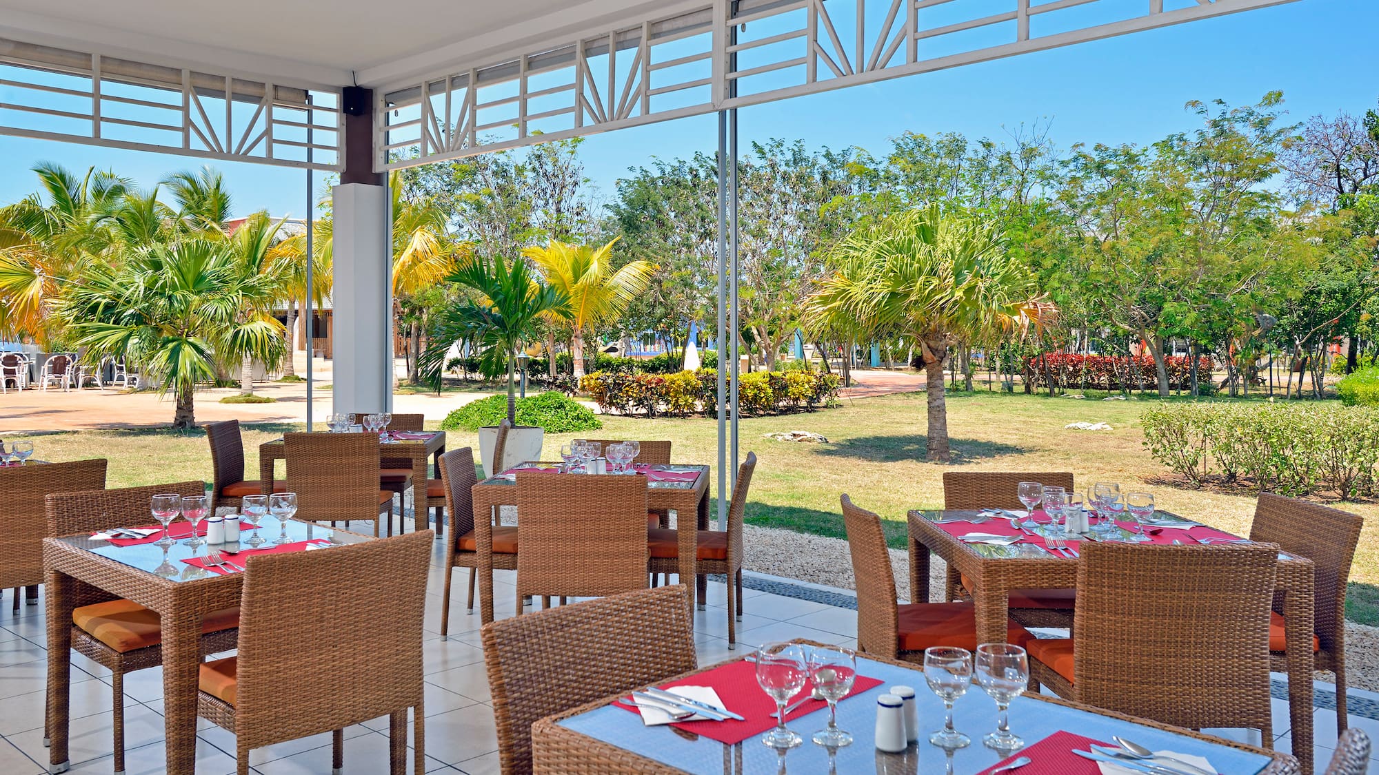 a restaurant with tables and chairs