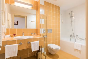 a bathroom with a sink and toilet