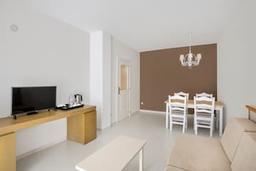 a room with a television and a table