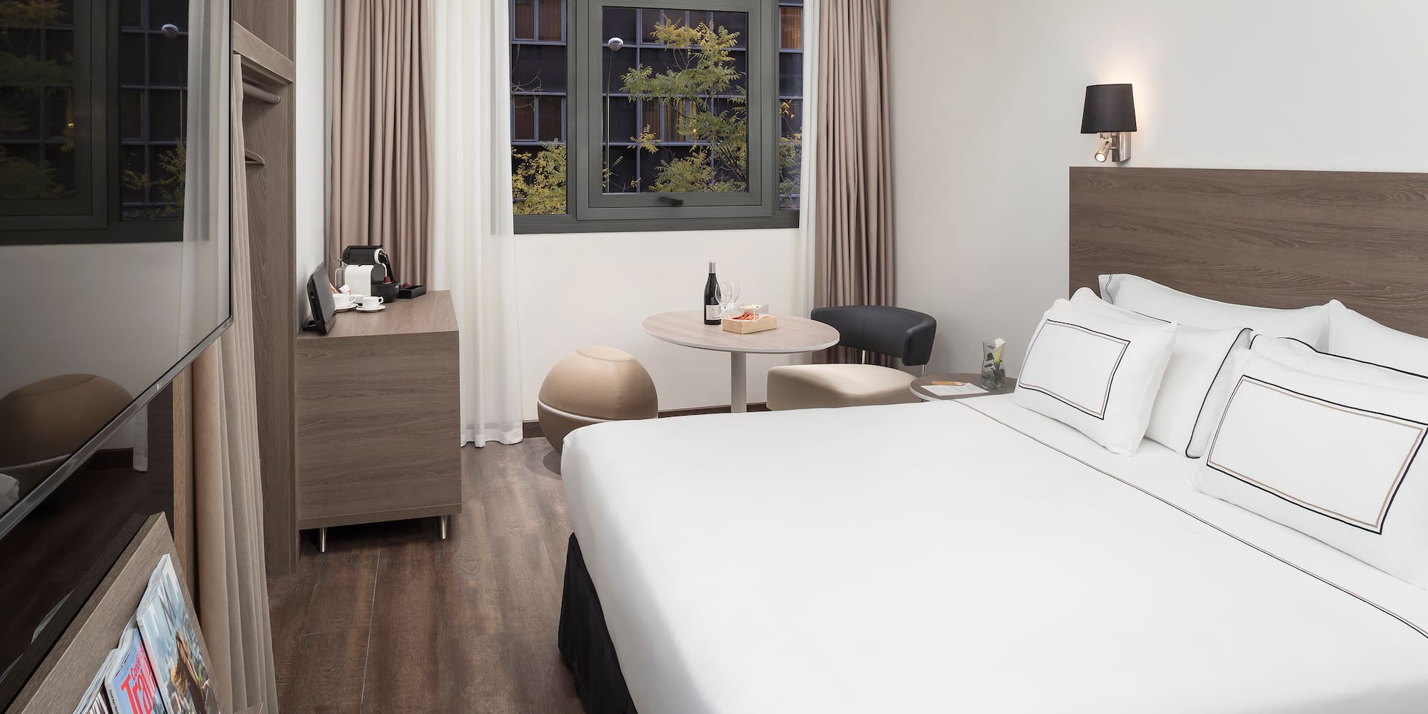 a room with a bed and a table